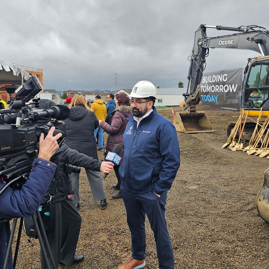 Juan Carlos Gonzalez being interviewed at a construction site